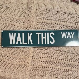 Green 'Walk This Way' Sign